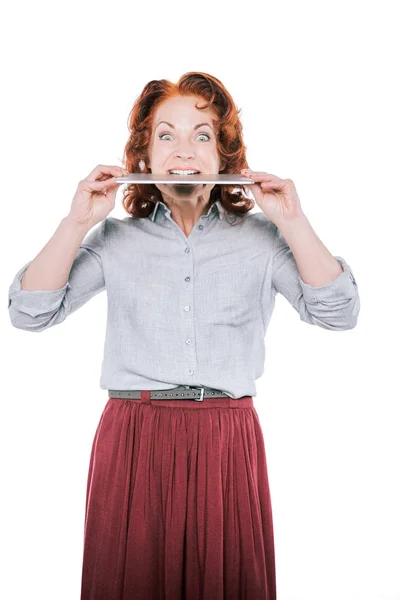 Woman biting digital tablet — Free Stock Photo