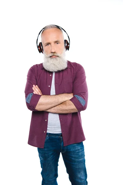 Senior man with headphones — Free Stock Photo