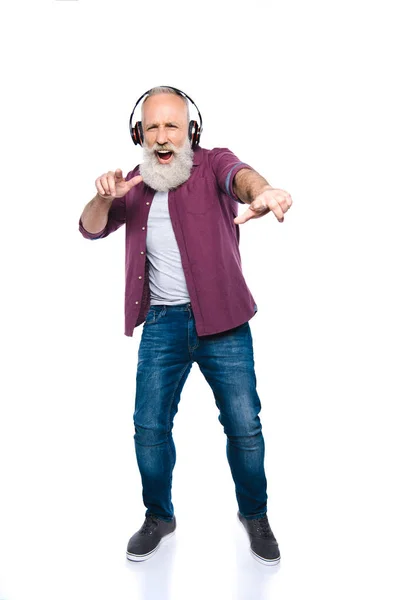 Homem cantando e dançando com fones de ouvido — Fotografia de Stock