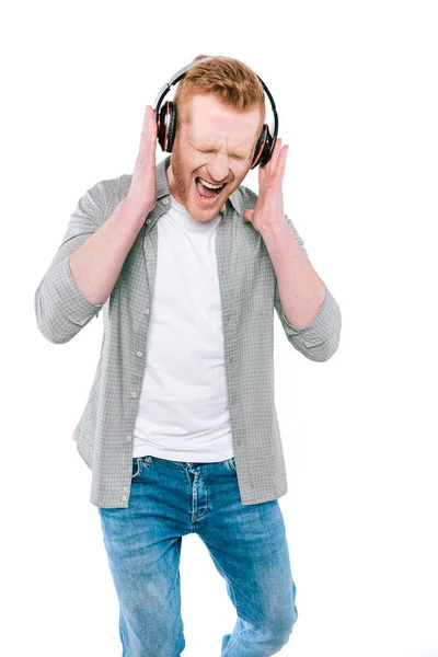 Man screaming and listening music — Stock Photo, Image