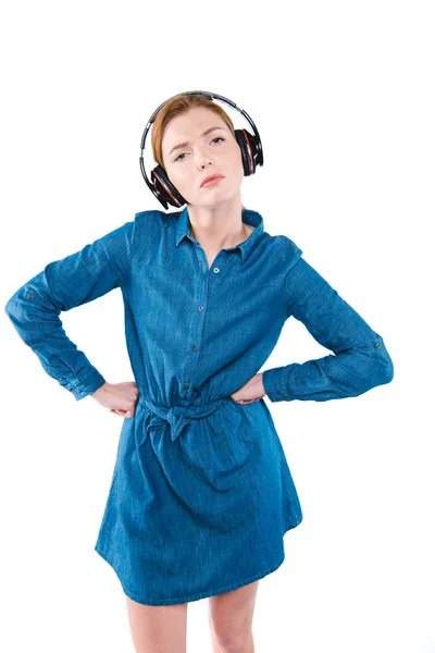 Dissatisfied girl with headphones — Stock Photo, Image