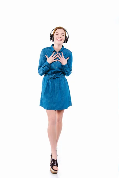 Smiling girl listening music — Free Stock Photo
