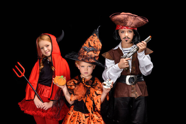 costumes of devil, witch and pirate