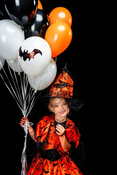Little witch with balloons — Stock Photo, Image