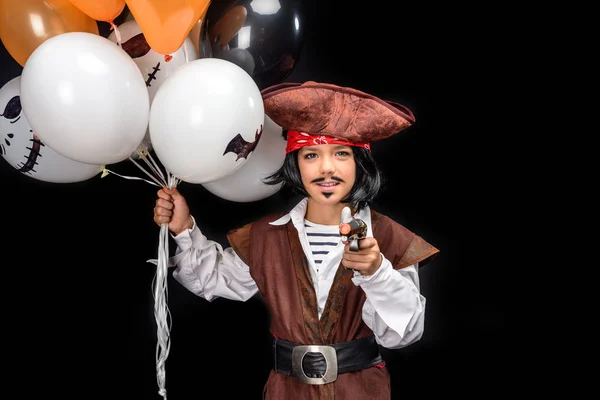 Pequeno pirata com arma e balões — Fotografia de Stock