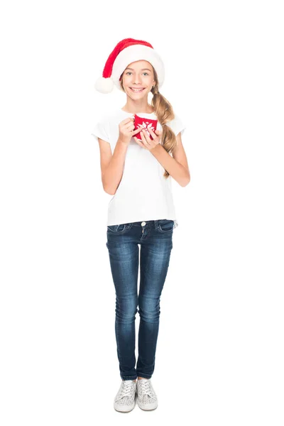 Teenager in Santa hat with coffee — Free Stock Photo