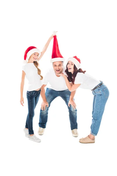 Happy family in Santa hats — Stock Photo, Image