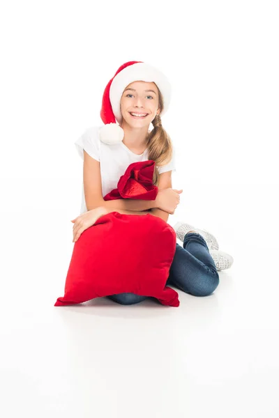 Smiling teenager with Christmas bag — Stock Photo, Image