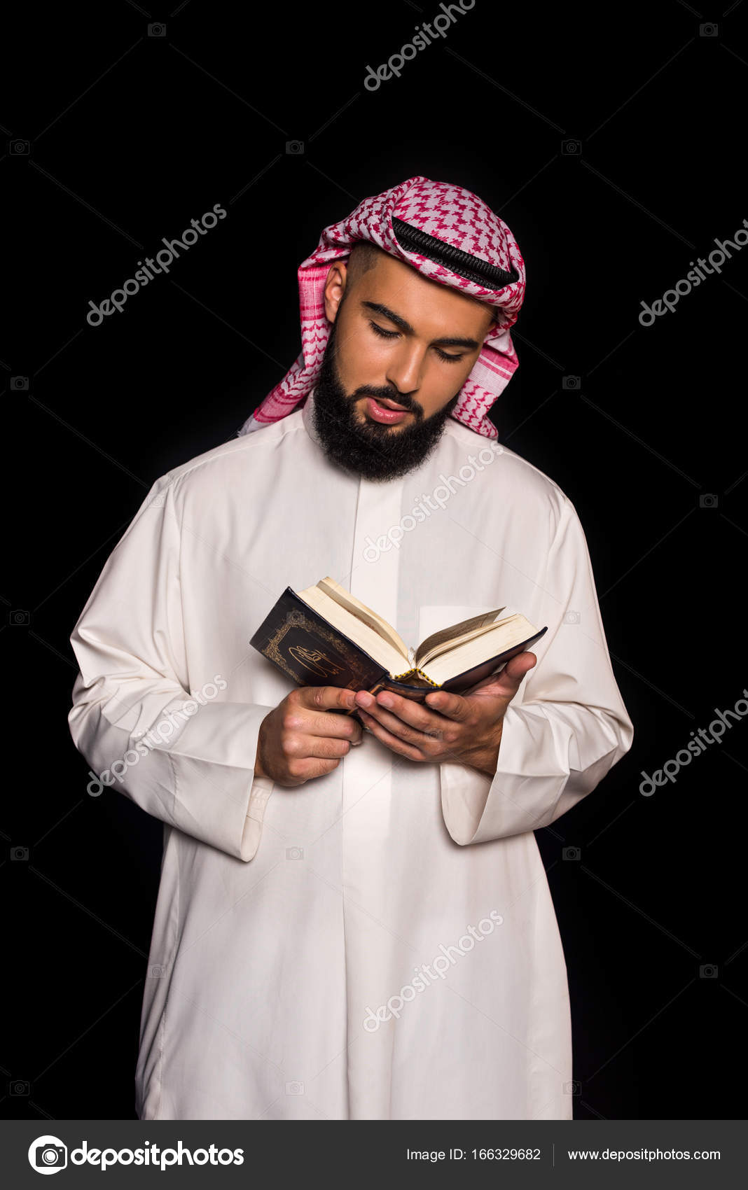 Muslim man reading quran Stock Photo by ©IgorVetushko 166329682