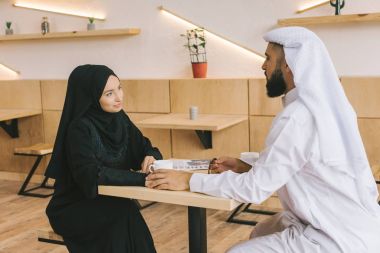 muslim couple having date clipart