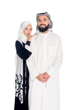 muslim couple in traditional clothing clipart