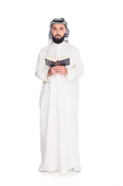 muslim man reading quran clipart