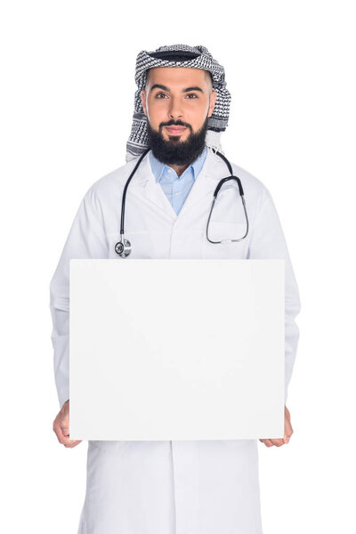 muslim doctor holding blank board
