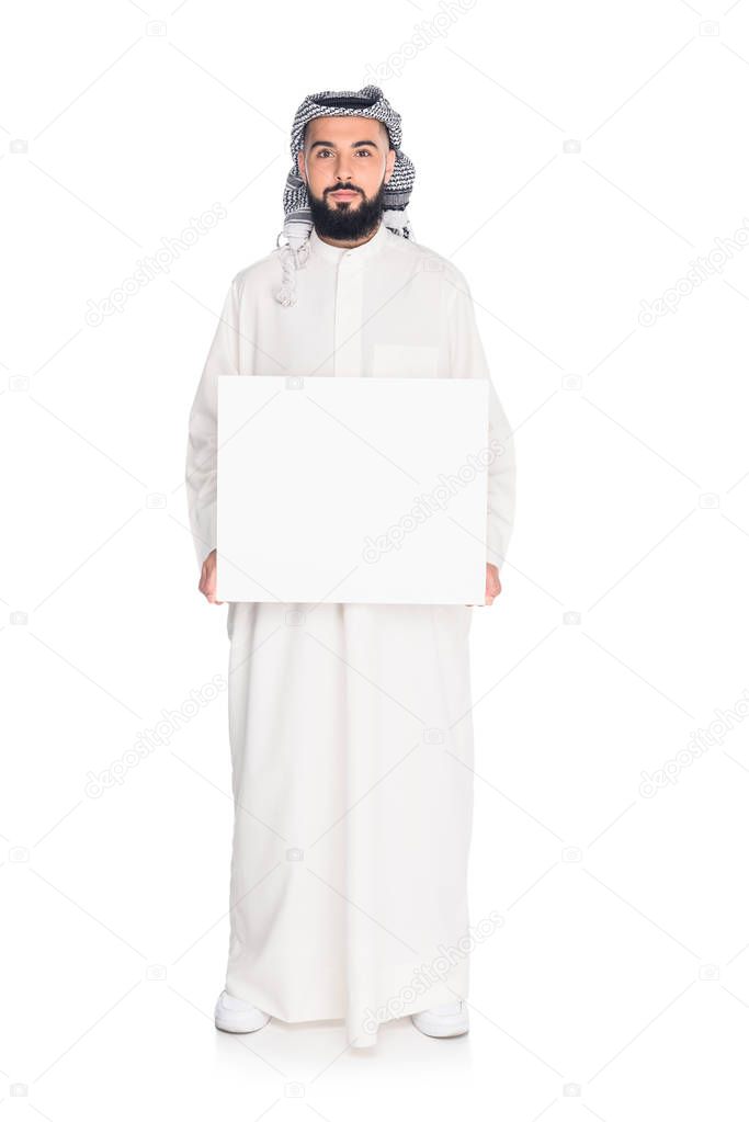 muslim man holding blank board