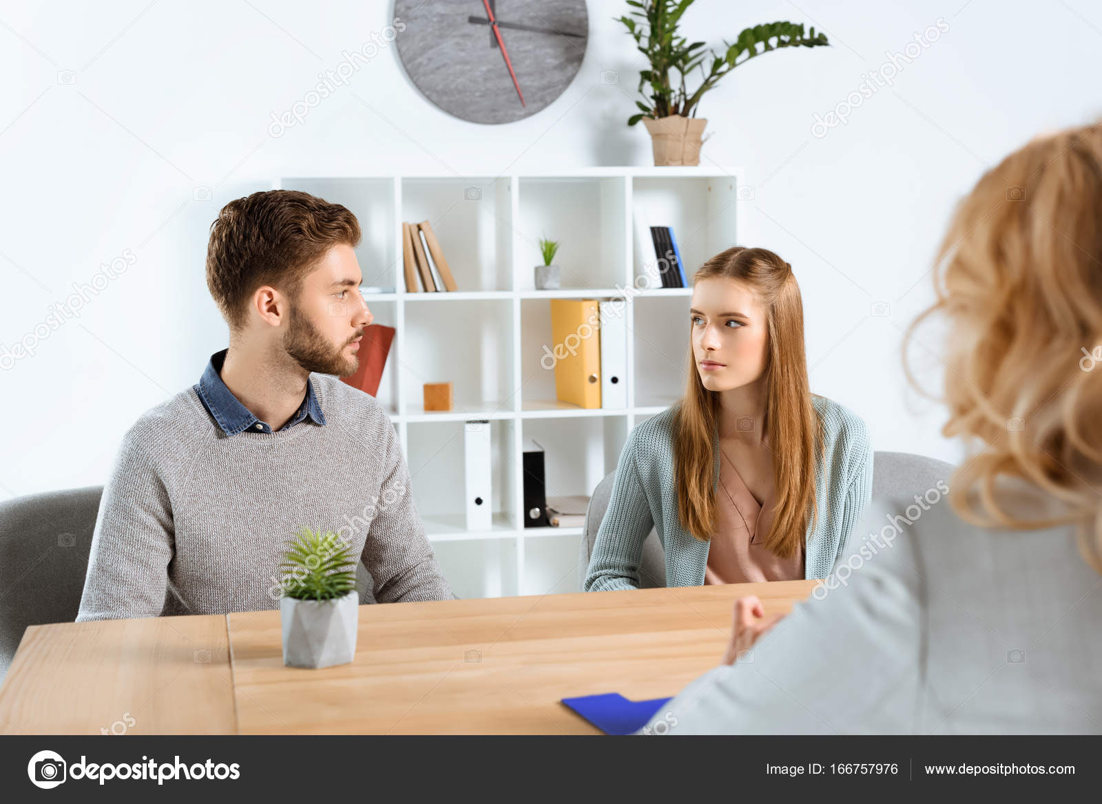 Young couple and psychologist — Stock Photo © IgorVetushko 166757976