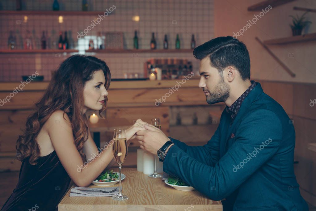 Couple having romantic dinner — Stock Photo © IgorVetushko #166901610