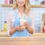 Waitress holding milkshake