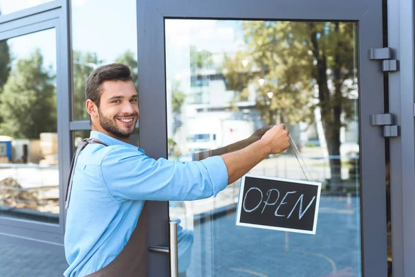 Cafe owner with sign open — Stock Photo, Image