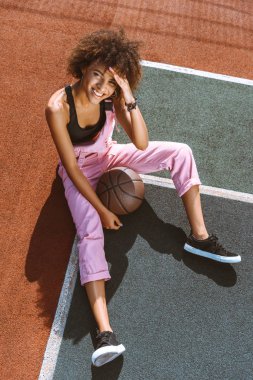 african-american at sports court with basketball clipart