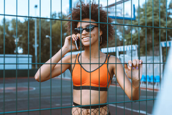 african-american woman talking on smartphone