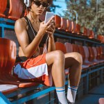 Athletic african-american woman in headphones