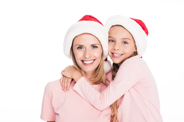 Mãe e filha abraçando no Natal — Fotografia de Stock