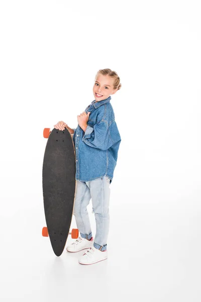 Little smiling skateboarder — Free Stock Photo