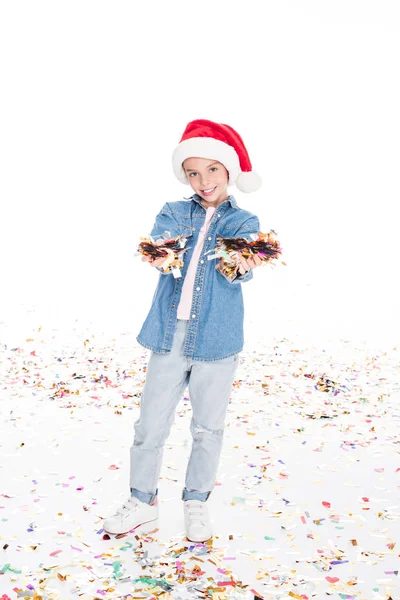 เด็กที่มี confetti ในวันคริสต์มาส — ภาพถ่ายสต็อกฟรี