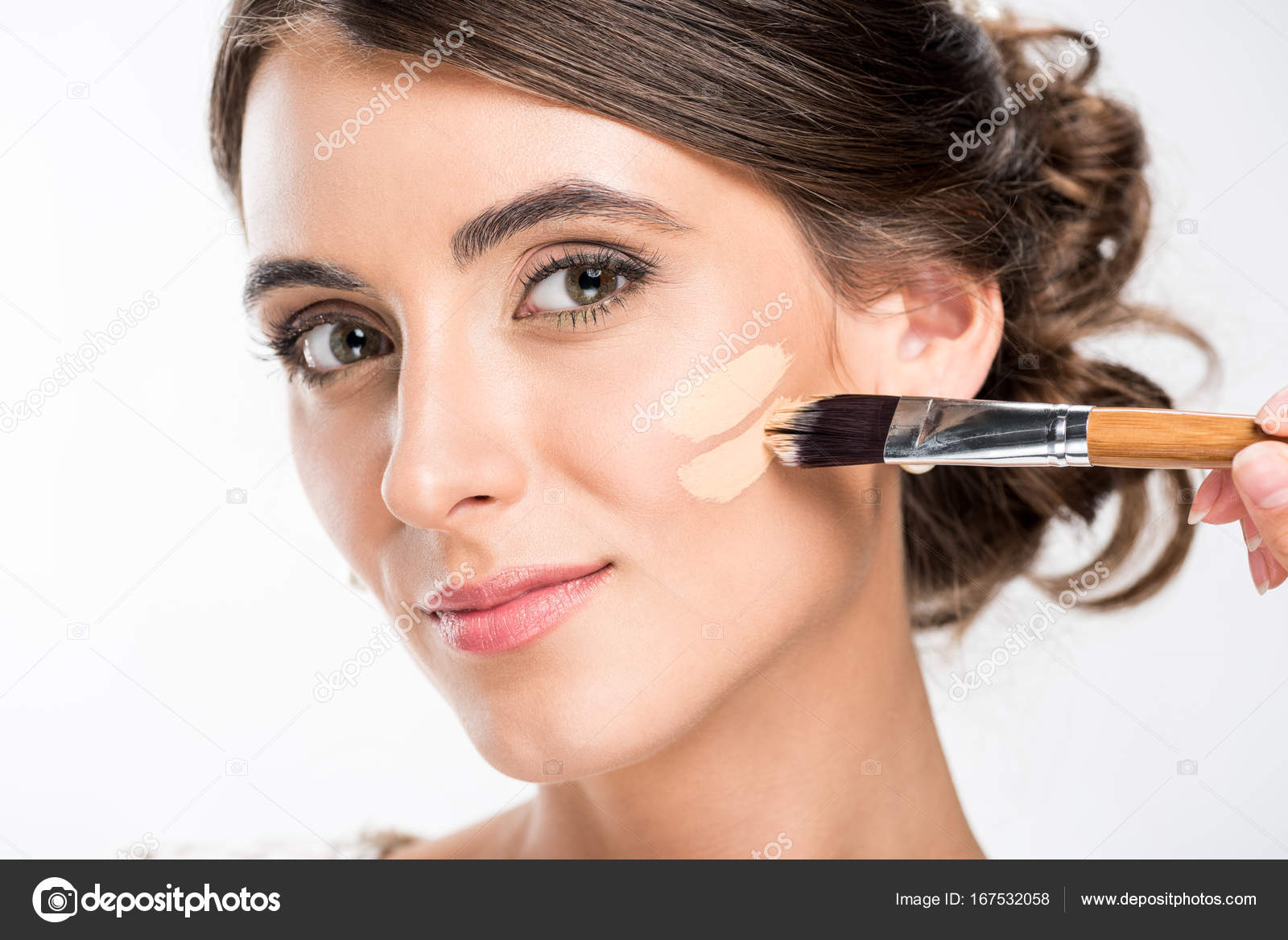 Makeup artist applying foundation Stock Photo by ©IgorVetushko 167532058