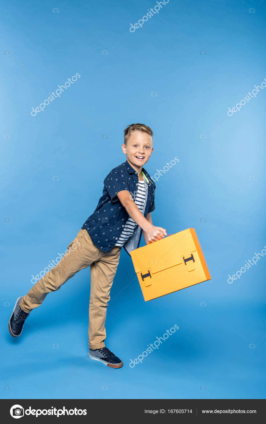 Kid Holding Briefcase Photos, Images and Pictures