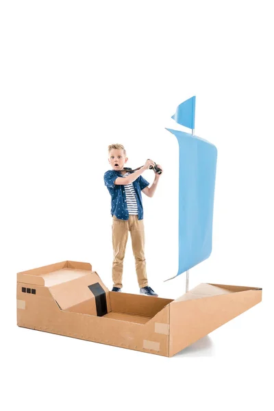 Boy playing with boat — Stock Photo, Image