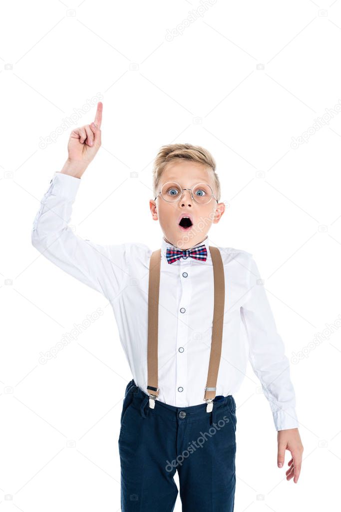 boy pointing up with finger  