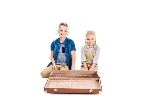 Children with empty suitcase — Stock Photo, Image