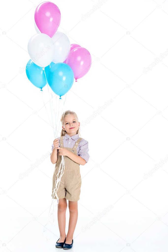 child with colorful balloons