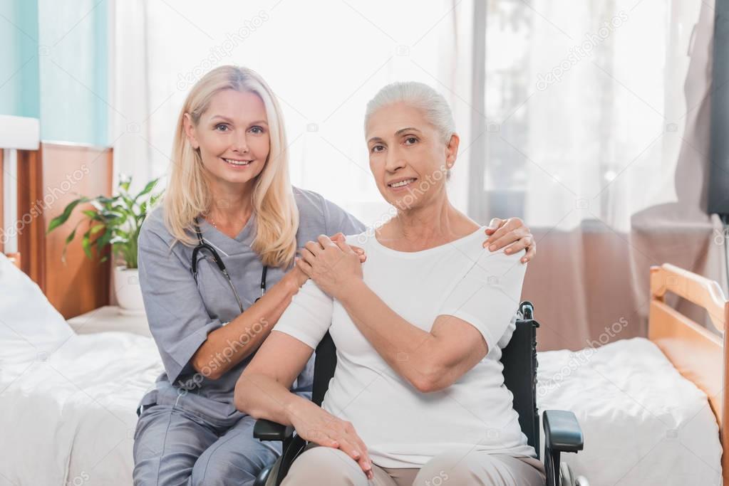 nurse and senior woman in wheelchair