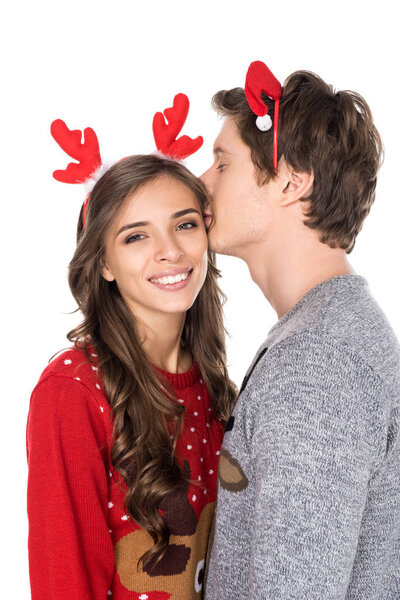 man kissing girlfriend