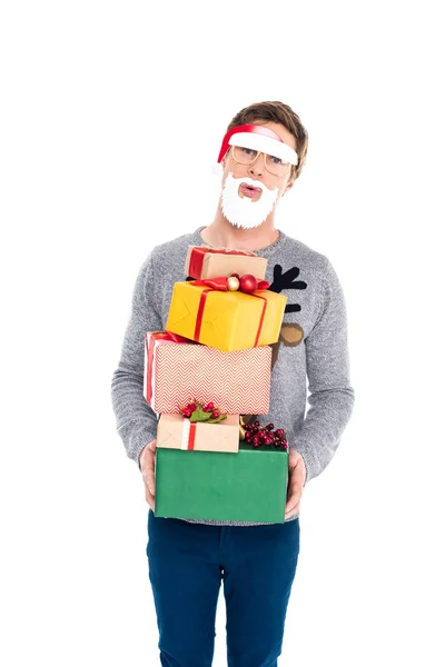 Hombre sosteniendo regalos de Navidad — Foto de stock gratis