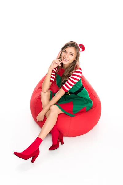 Woman in elf costume on bag chair — Stock Photo, Image