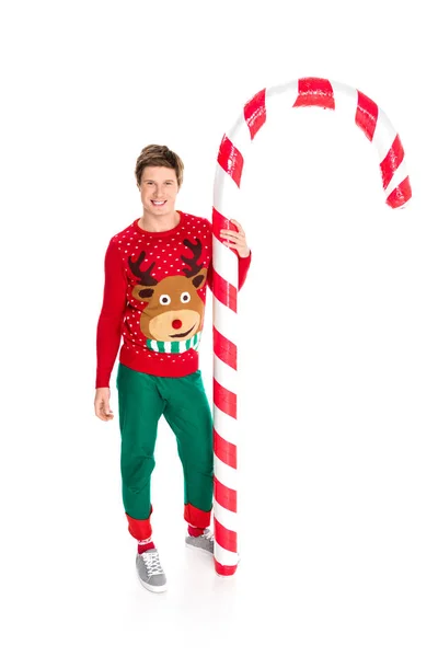 Man with christmas decorative lollipop — Stock Photo, Image