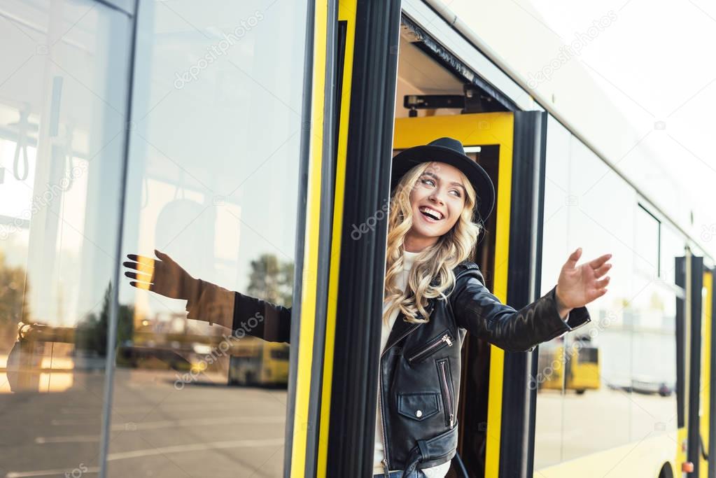 cheerful woman in bus