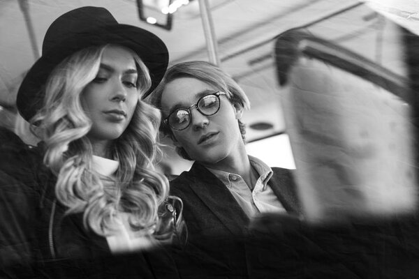 young couple in public transport