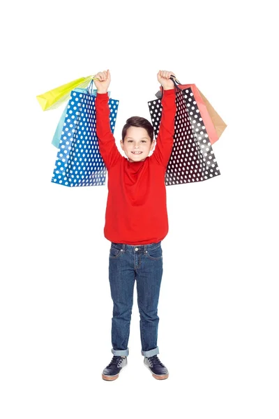 Jongen met shopping tassen — Stockfoto