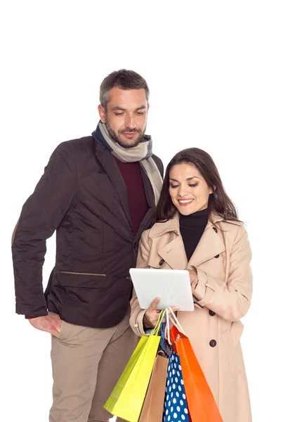 Couple with digital tablet — Free Stock Photo