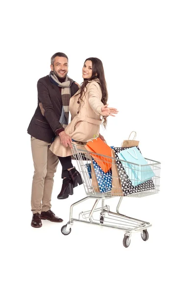 Couple with shopping cart — Free Stock Photo