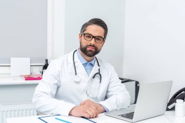 doctor sitting at workplace