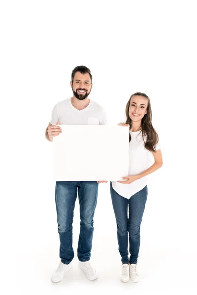 Pareja con banner en blanco — Foto de Stock