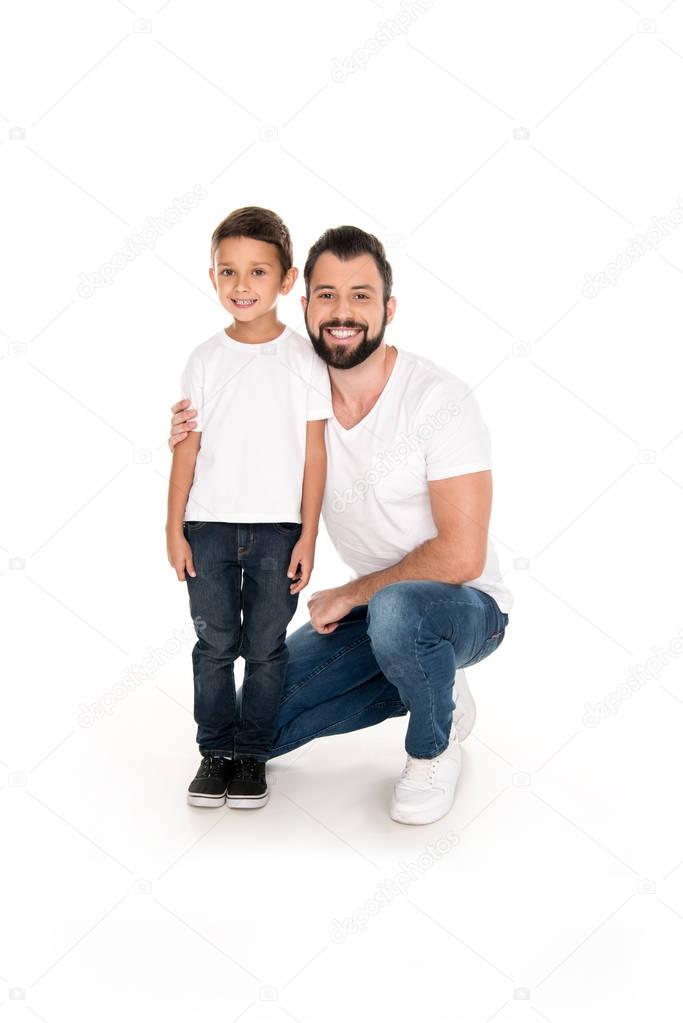 smiling father and son