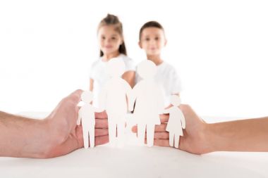 Paper family in hands clipart