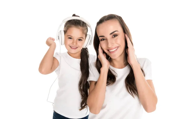 Mother and daughter in headphones — Stock Photo, Image