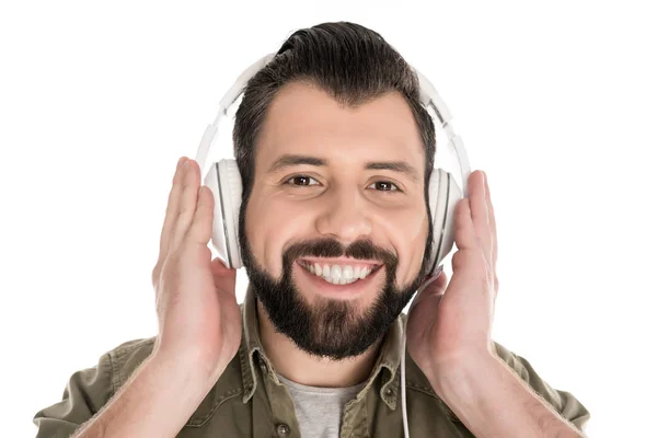 Man die muziek luistert met een koptelefoon — Gratis stockfoto